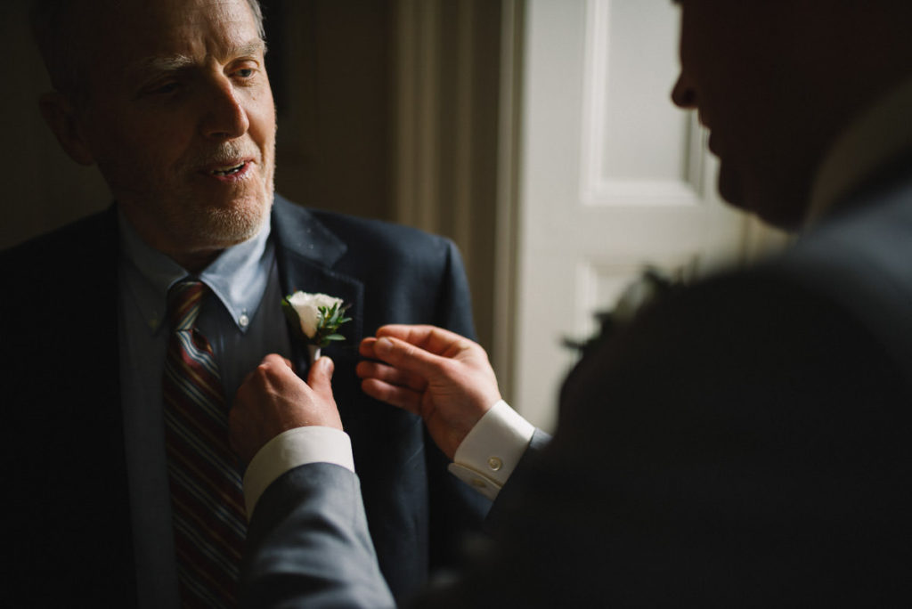 father of the bride getting ready
