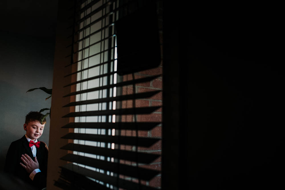 groom and son getting ready