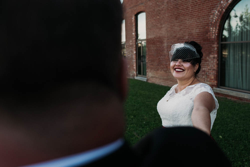 bride looking at groom
