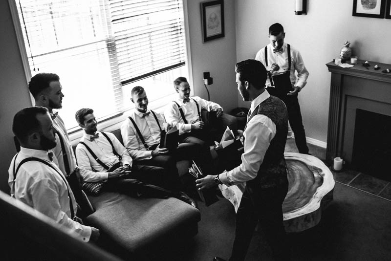 groom giving his groomsmen gifts