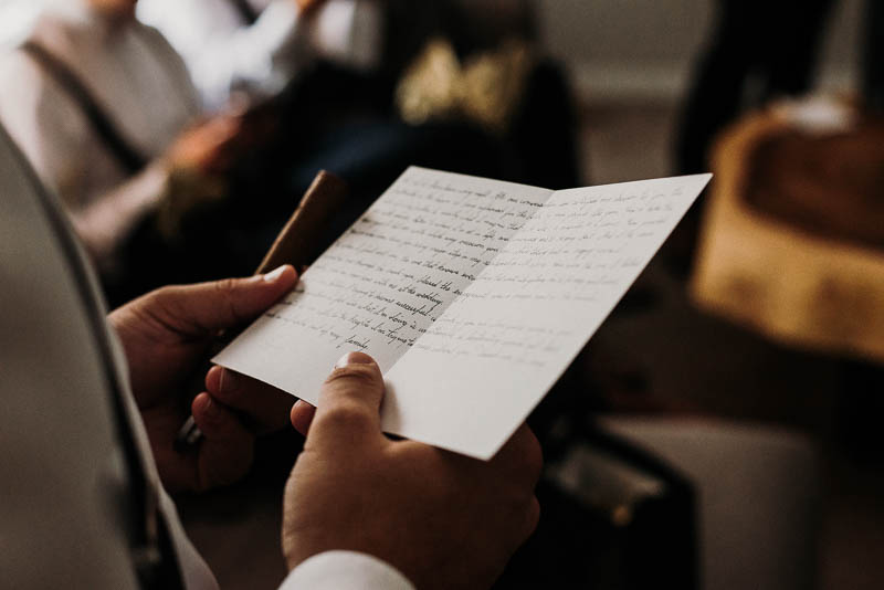 groom reading bride's note