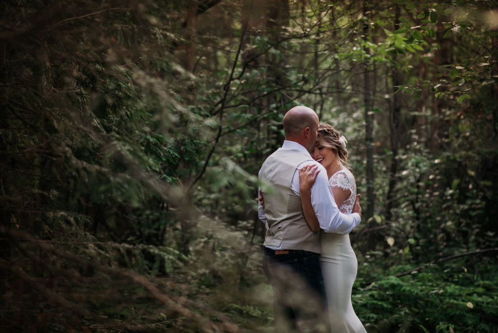 bride and groom portraits during their backyard wedding