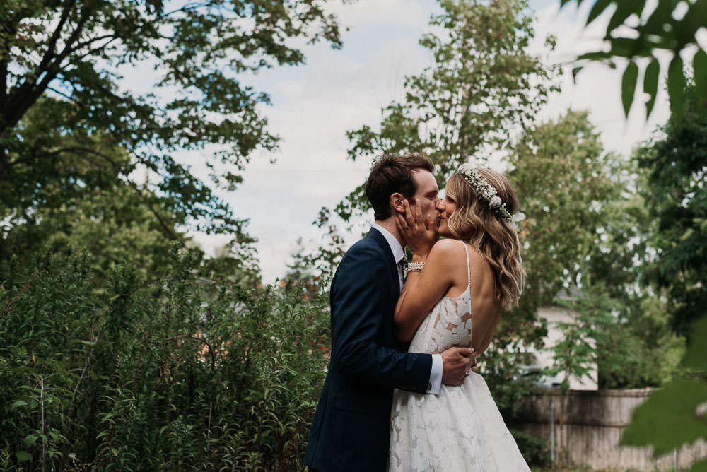 bride and groom kissing