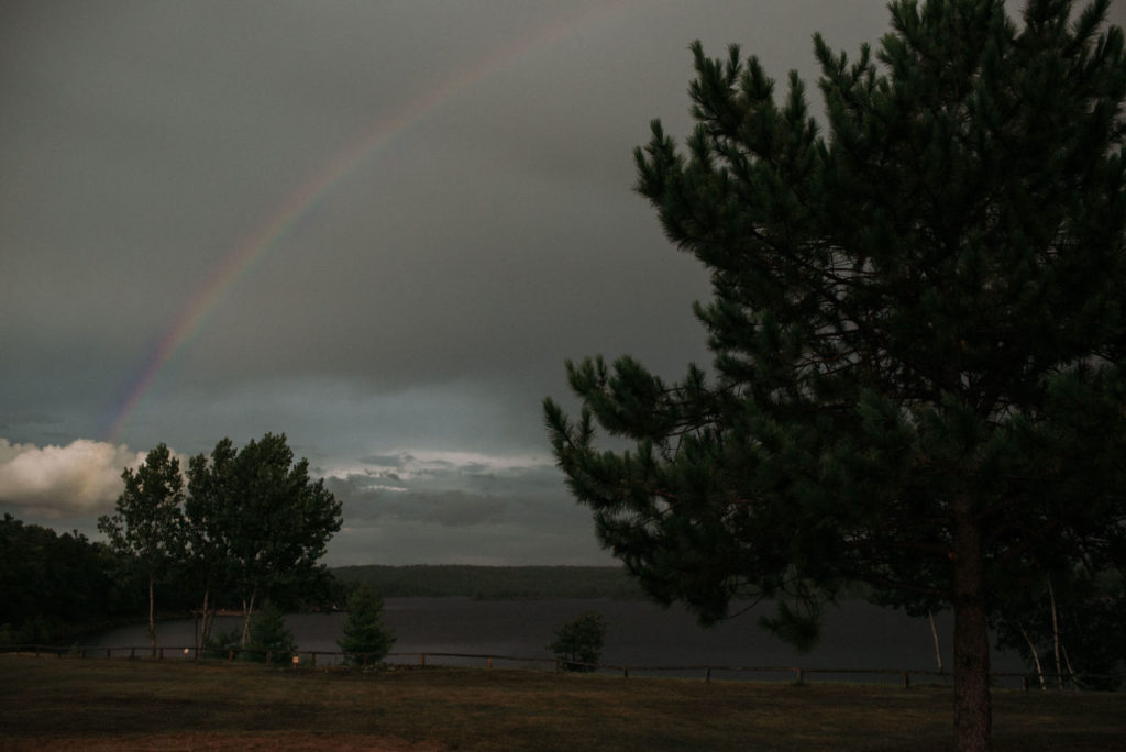rainbow during backyard wedding