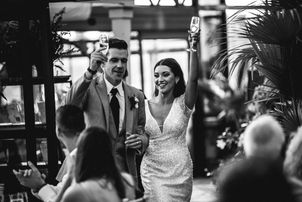 bride and groom entrance for their wedding at aquatopia