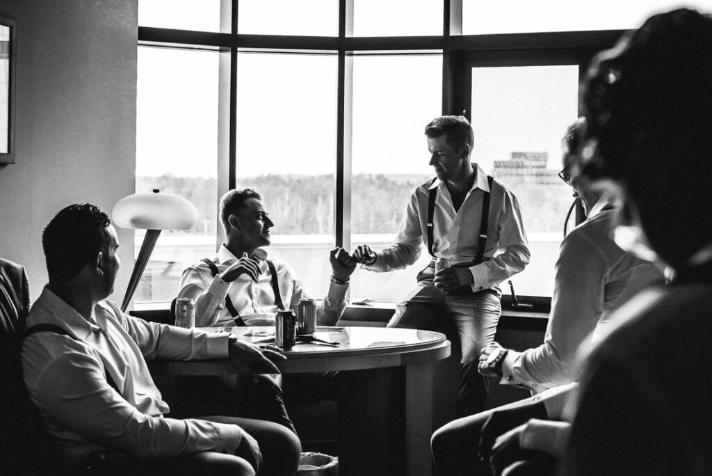 groom fist pumping best man