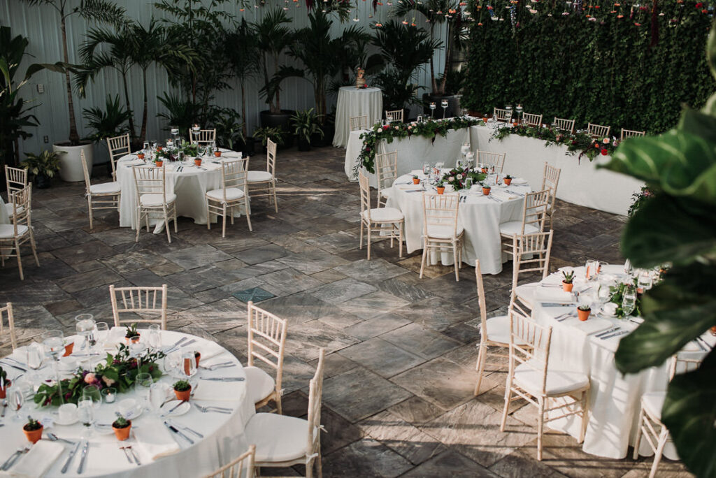 beautiful table set up and decorations for wedding at aquatopia
