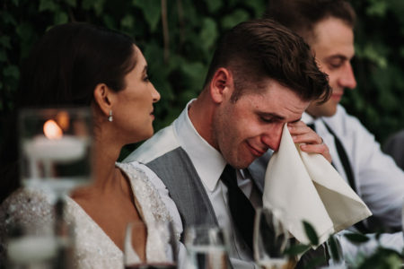 groom crying at aquatopia wedding