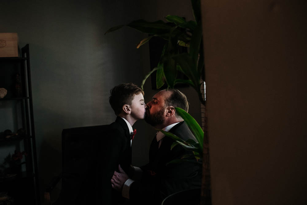 groom and son getting ready