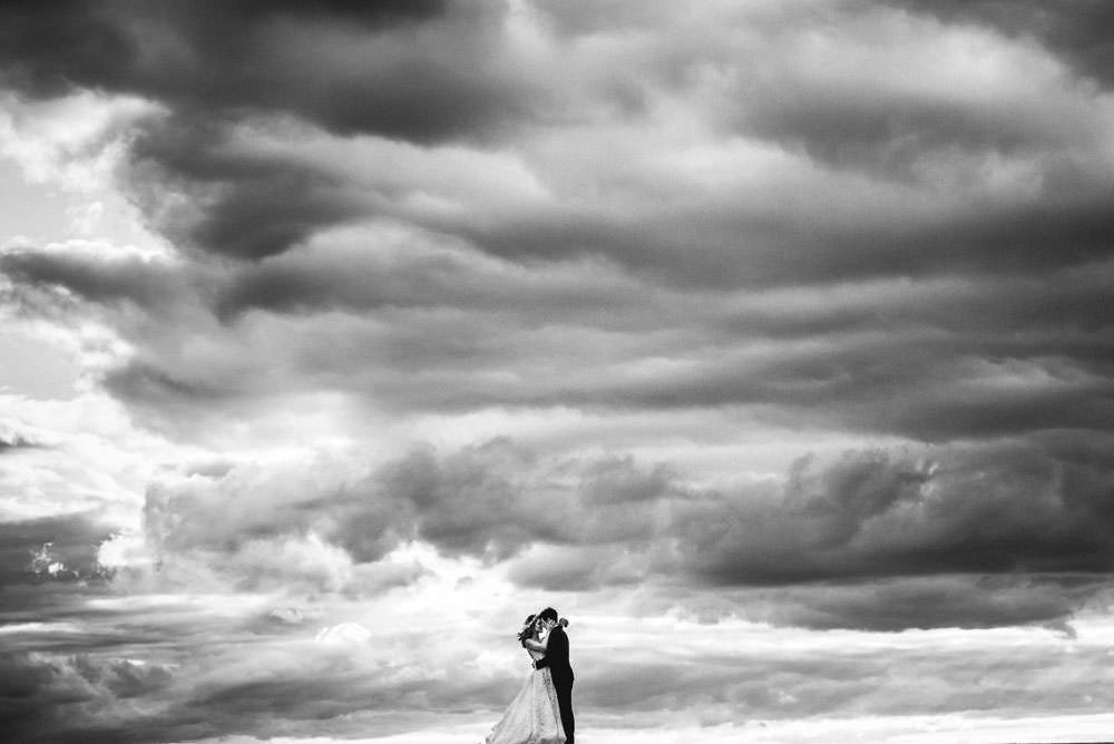 bride and groom with big sky