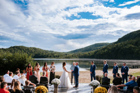wedding ceremony by lake in Montebello
